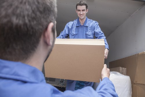 House removal team preparing a move in central Holborn street