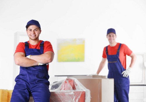 Furniture pick-up service in Holborn with a team preparing bulky items for collection