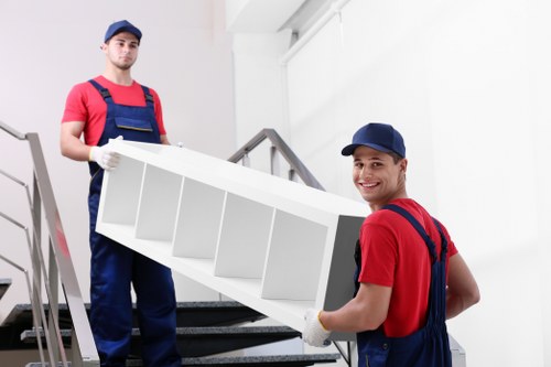 Van loading service in central Holborn street setting