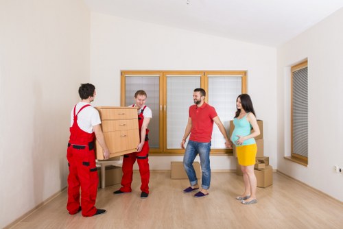 Loading household items into a removal van near Holborn properties