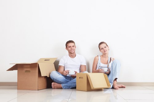 Mover carrying furniture for a Holborn flat or office move