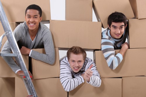 Packed boxes and furniture in a Holborn apartment move