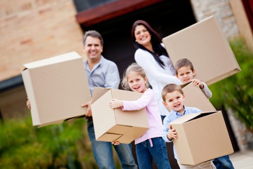 Local van moving boxes and furniture for a Holborn home move