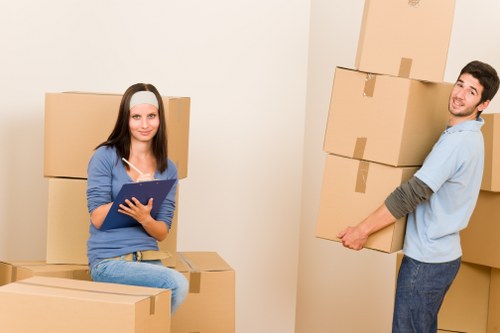 Packed belongings and moving equipment ready for a Holborn relocation